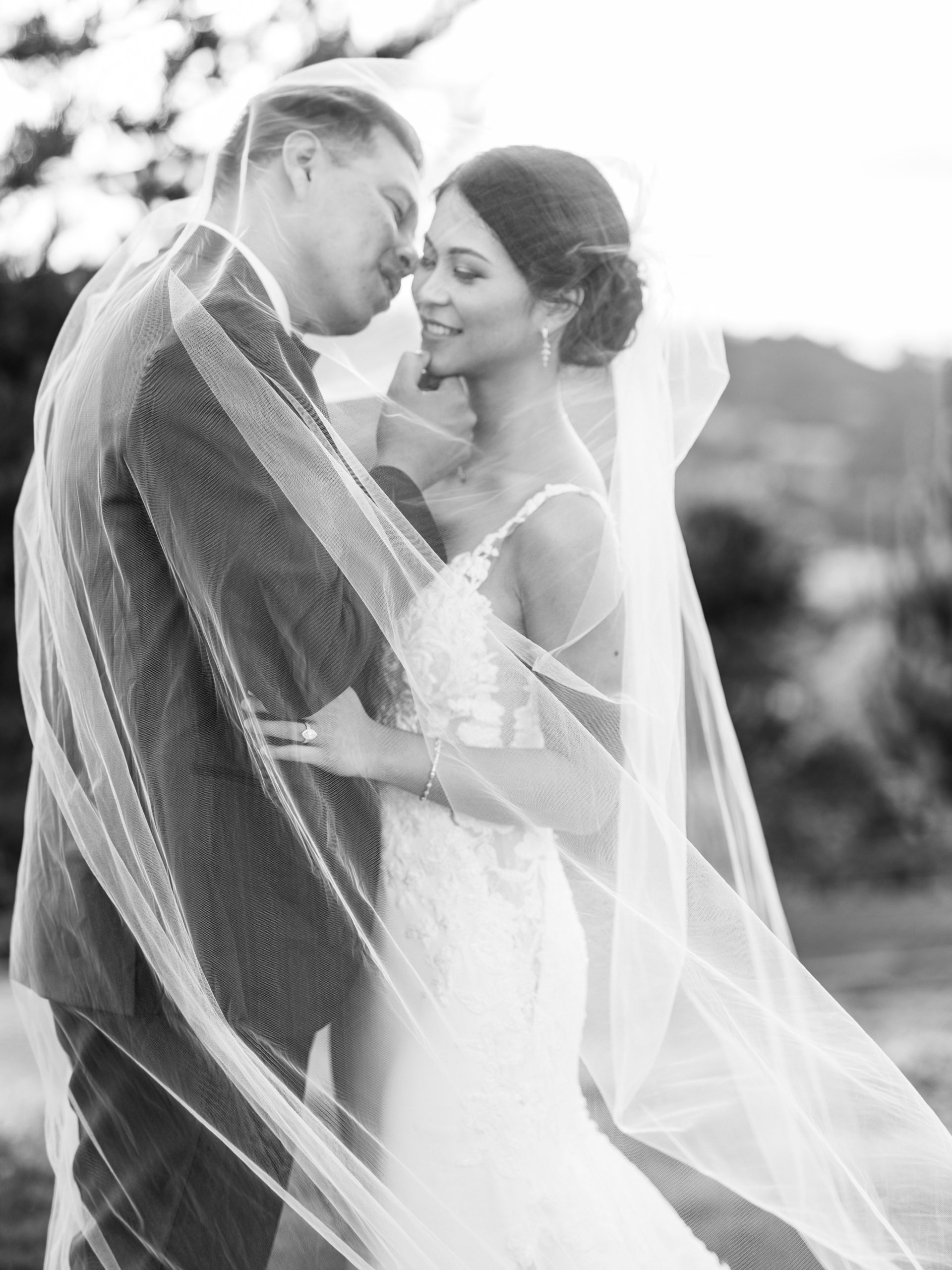 Tehama Golf Club Wedding Bride and Groom share a romantic moment under the veil
