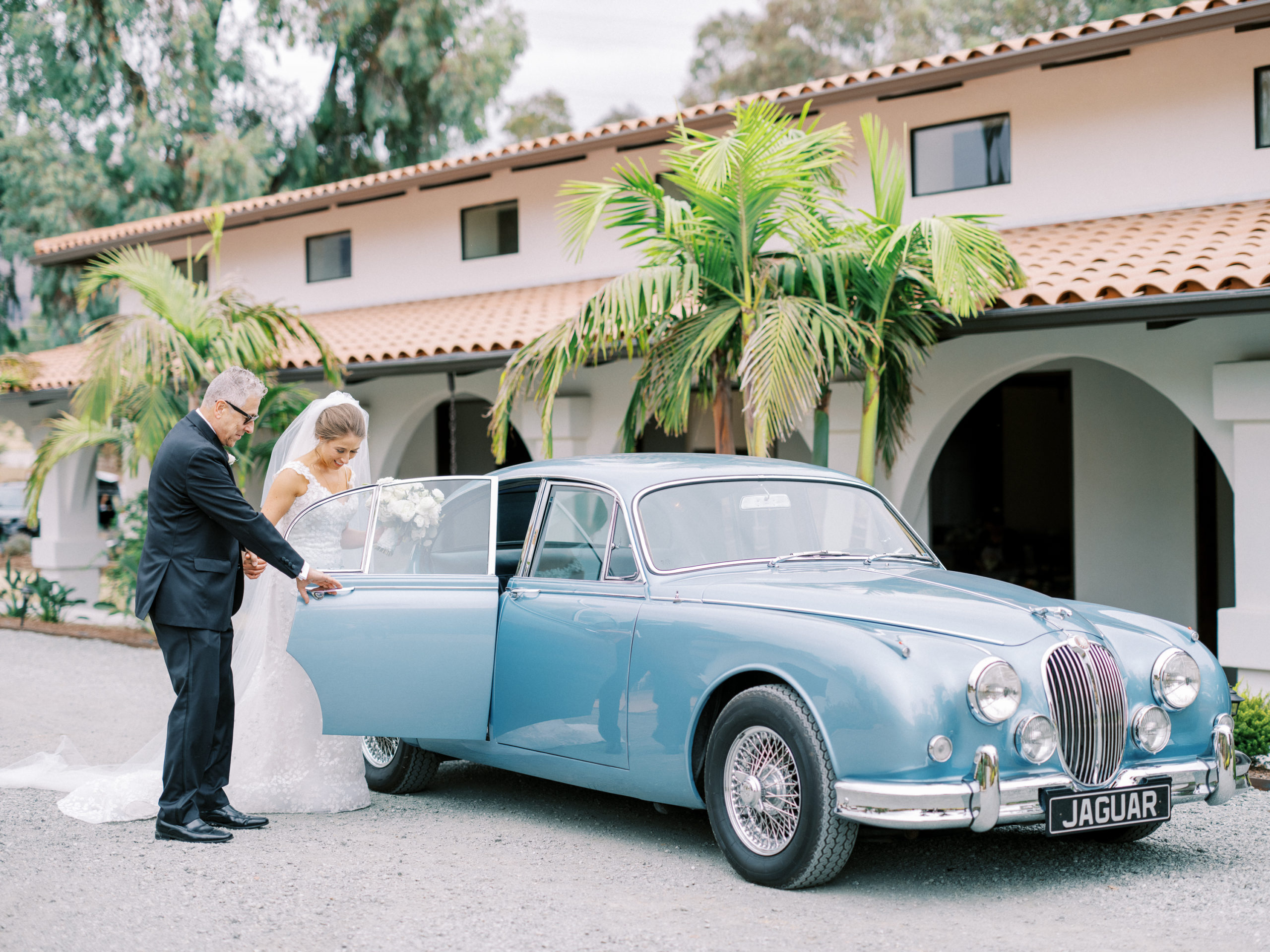 Vintage 1962 Jaguar takes the bride to her ceremony from La lomita ranch wedding