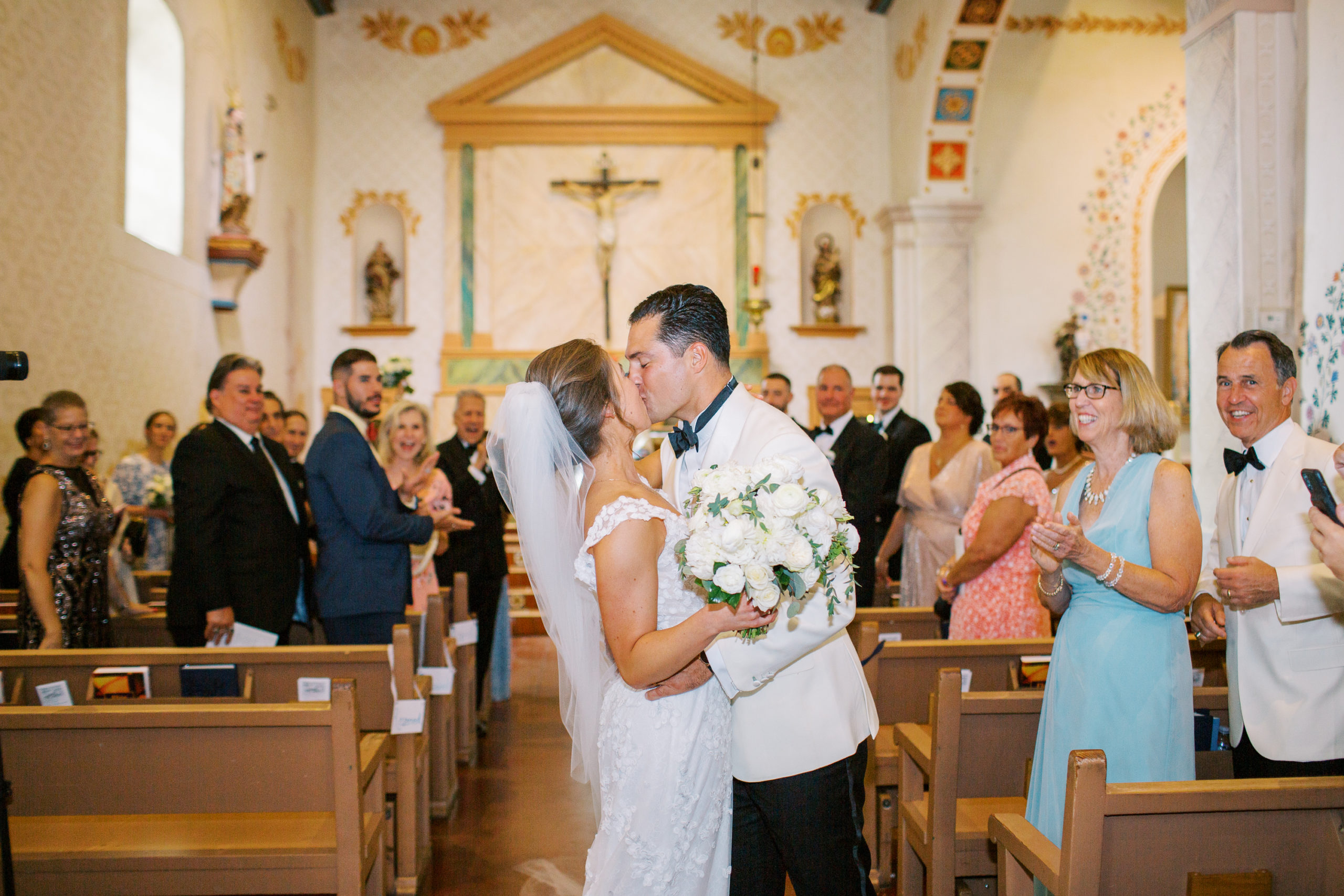 Bride and Groom kiss at San Luis Obispo Mission Reception at La lomita ranch wedding
