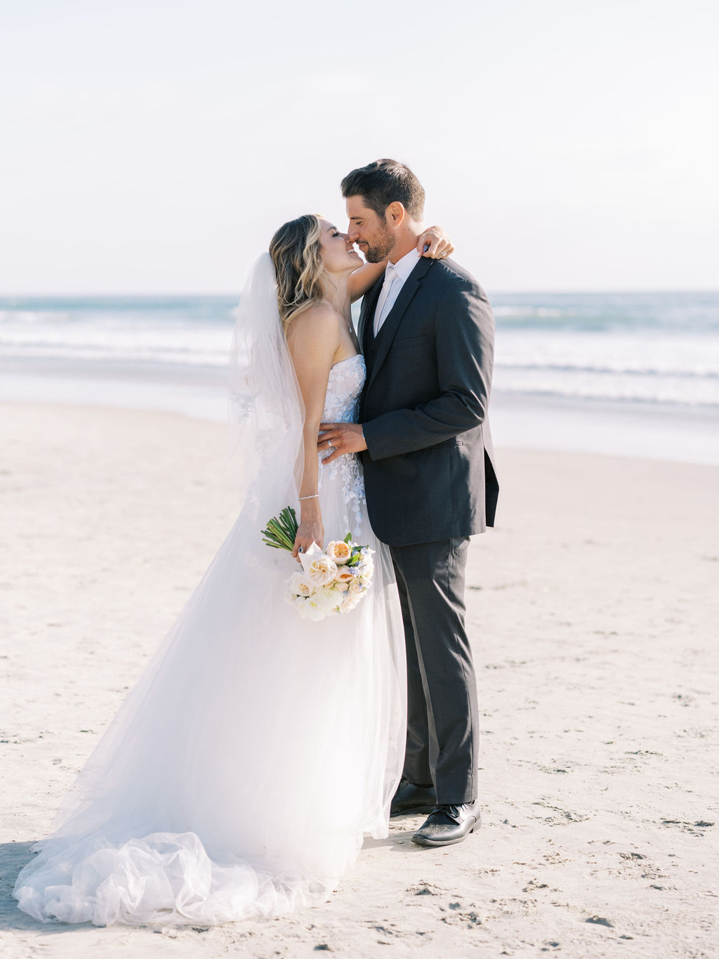 L'Auberge Del Mar Wedding bride and groom on beach seagrove park