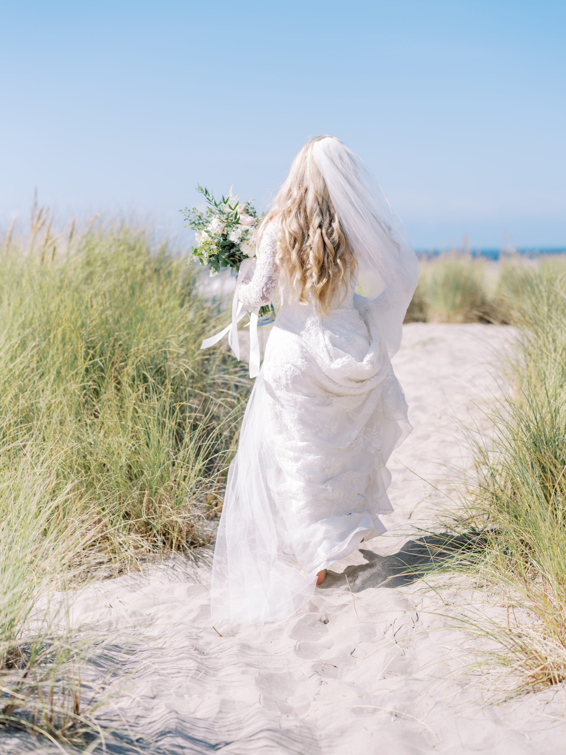 Cannon Beach Wedding - walking through seagrass
