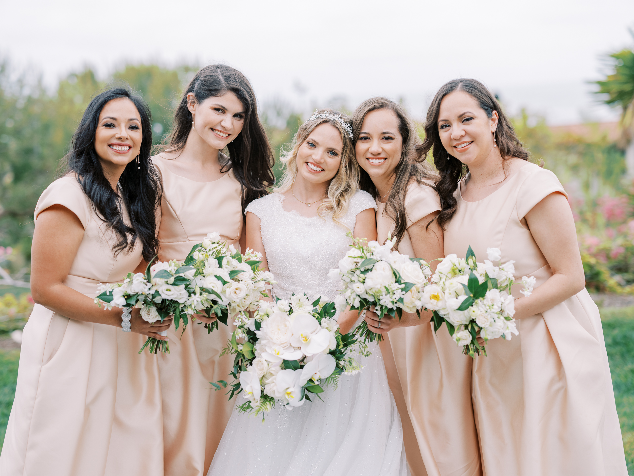 Terranea wedding bridesmaids with orchids