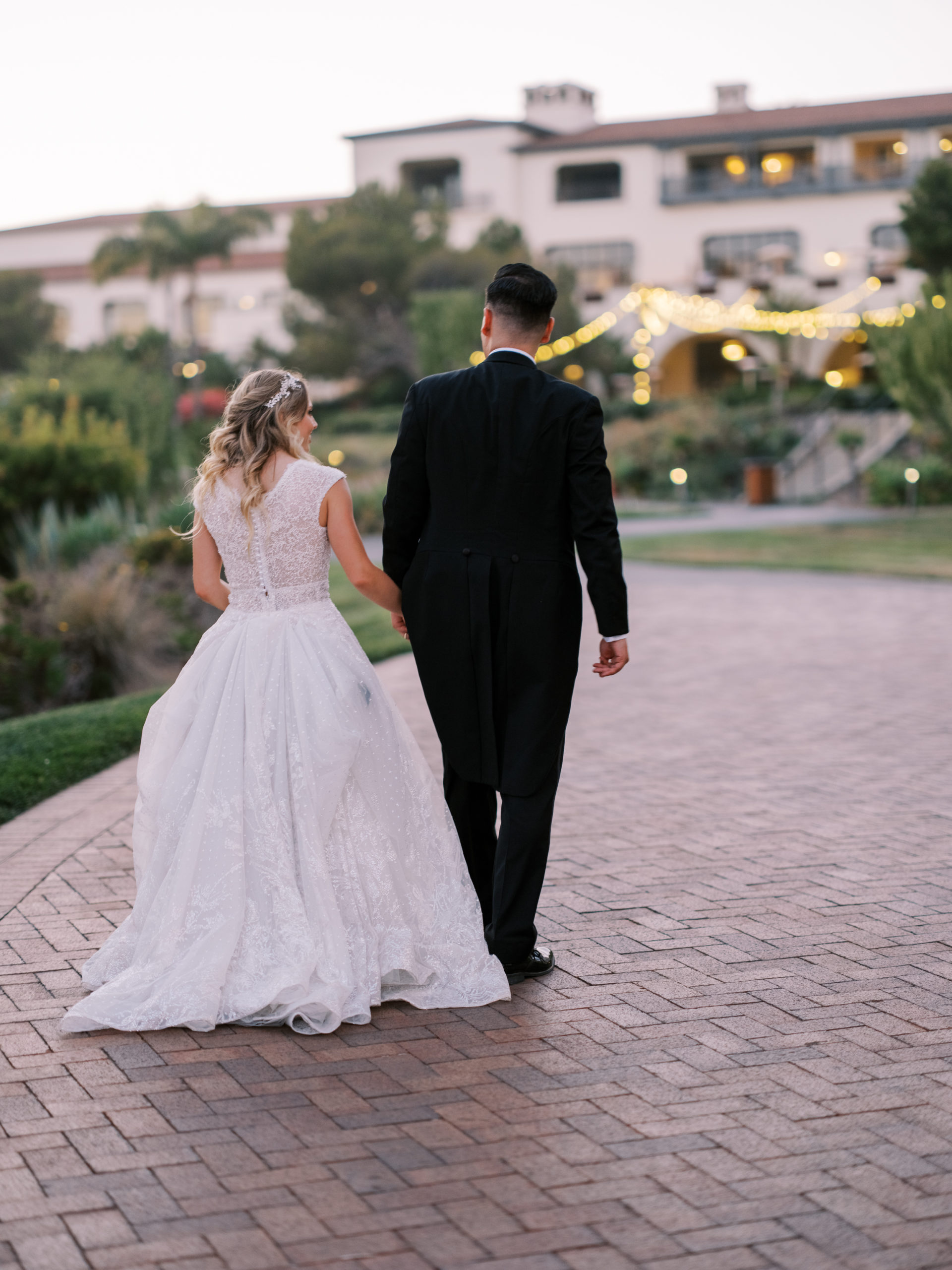 Terranea wedding bride and groom walking to reception