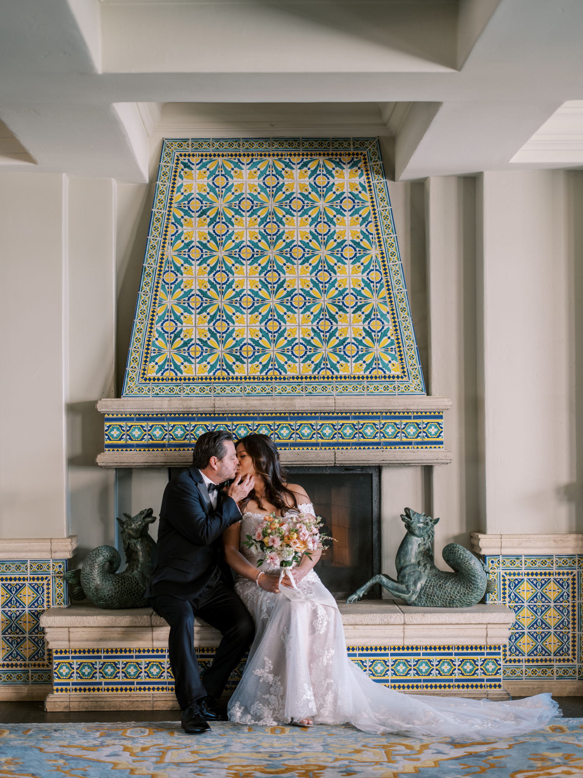 Bride and Groom at La Valencia Hotel restaurant fireplace