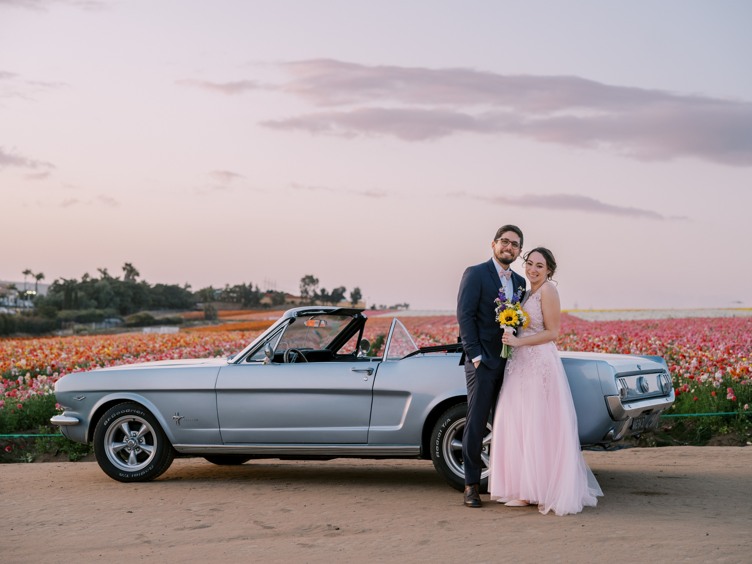 classic mustang getaway car with bride and groom carlsbad wedding