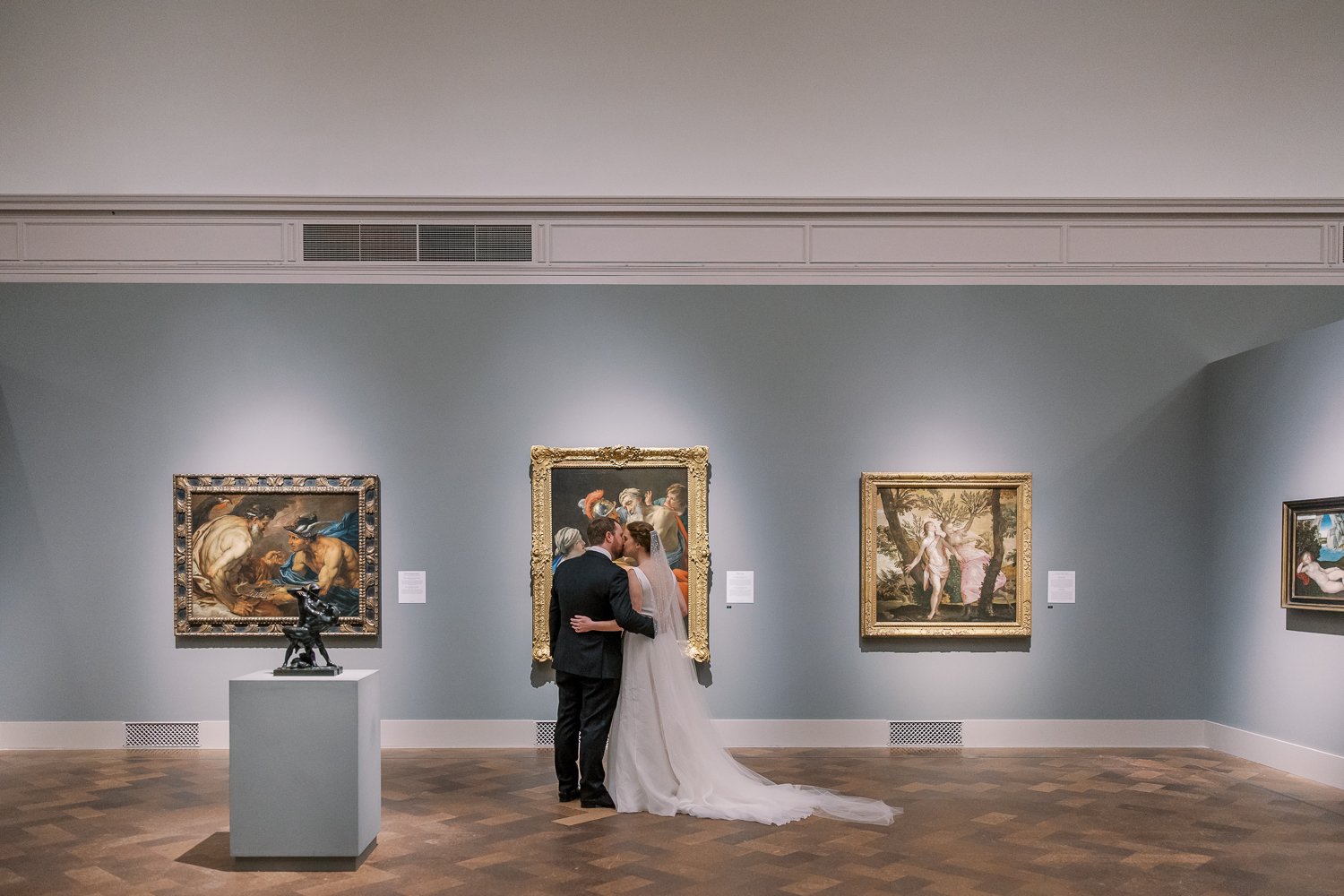 San Diego Museum of Art wedding bride and groom in gallery