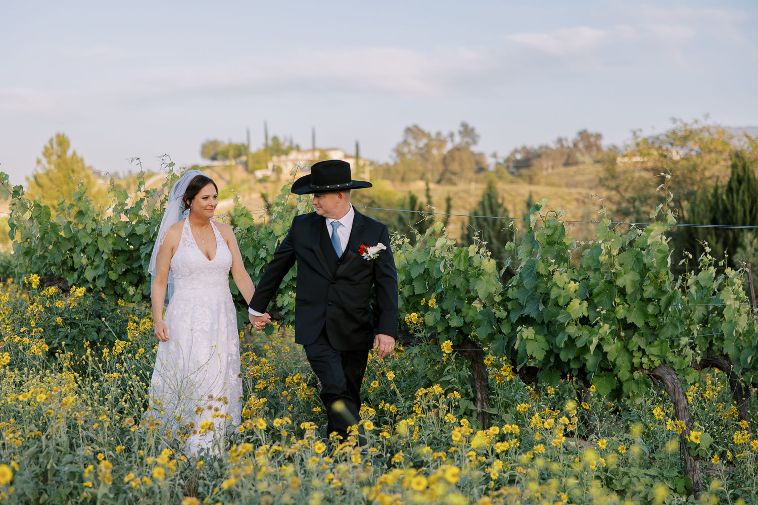 Classic wine country wedding with rustic groom style