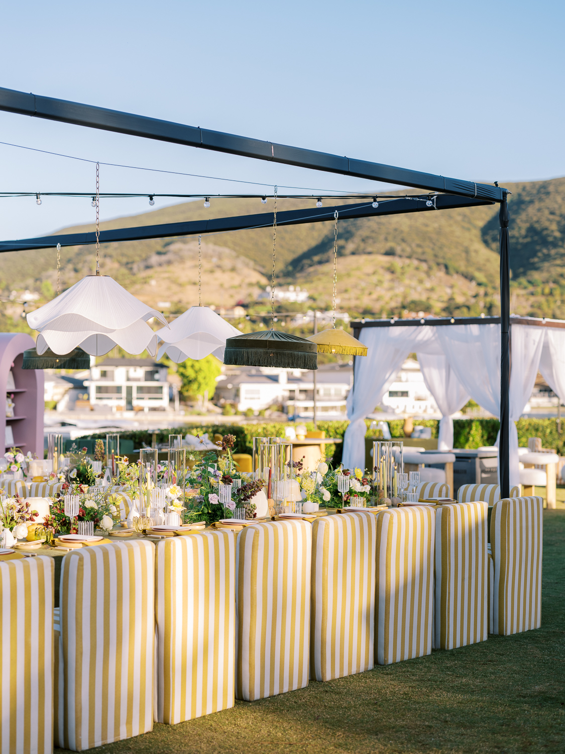Striped yellow chairs at Lakehouse Resort San Marcos 