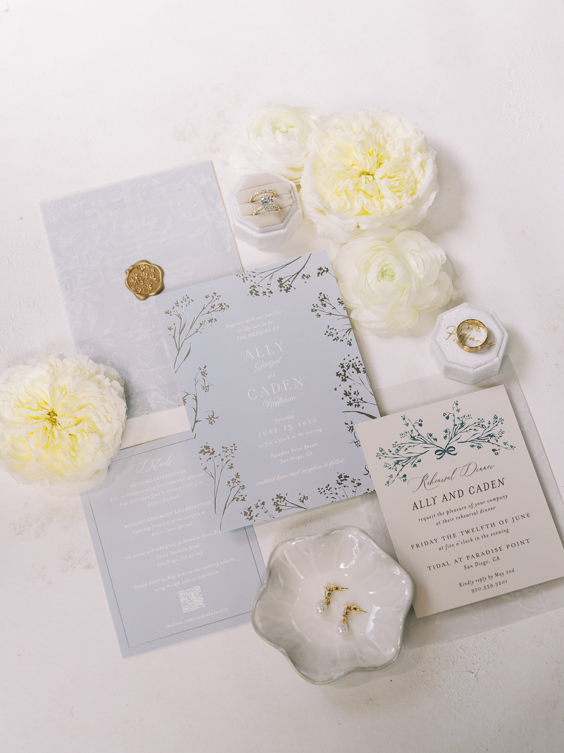 The couple's wedding details included a light blue invitation suite for guests to join them in San Diego.