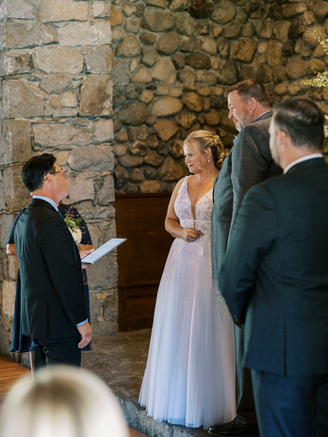 The officiant was a close friend of the bride and groom, and brought everyone to tears with his words.