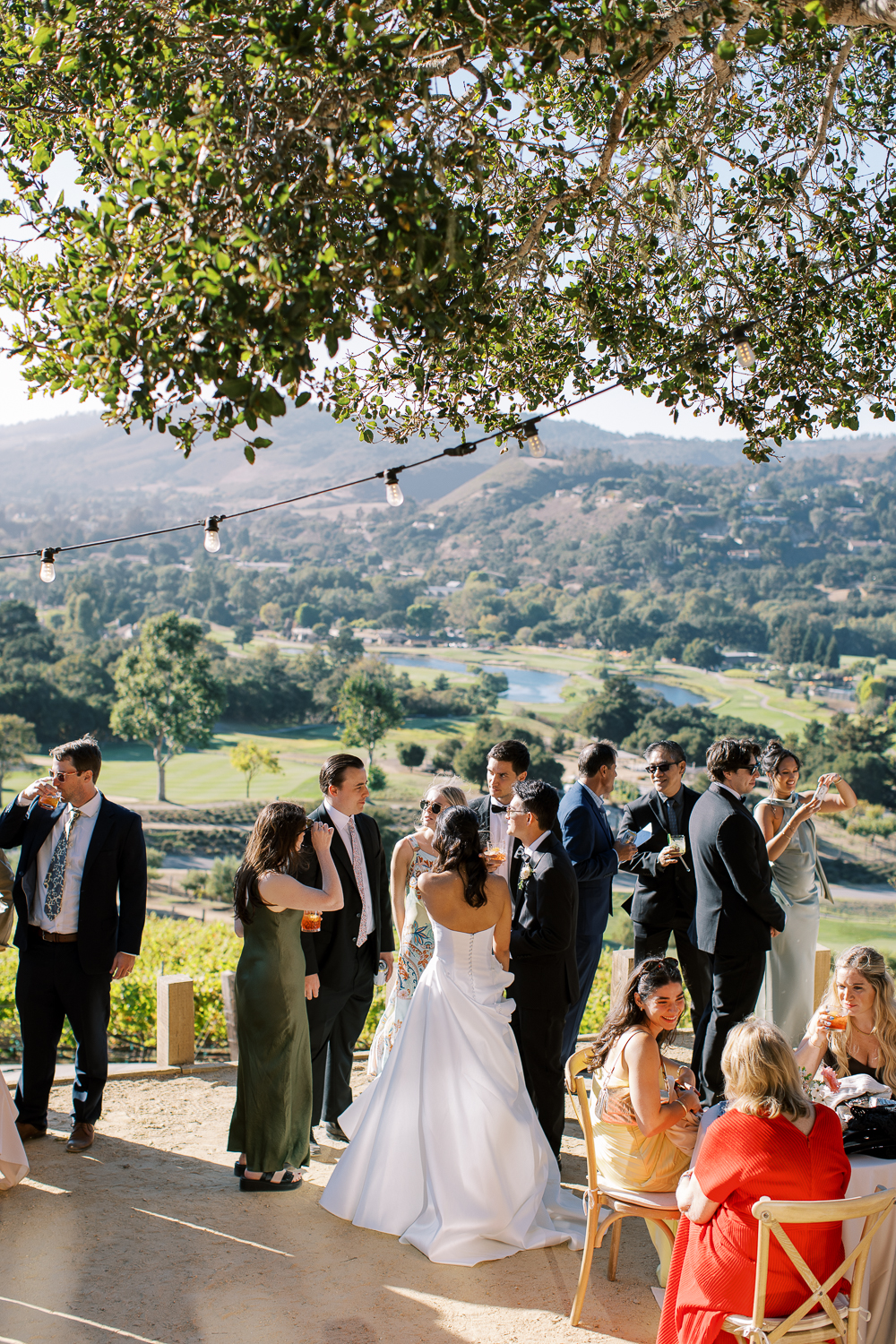 View of bride and groom enjoying cocktails at Harvest Landing