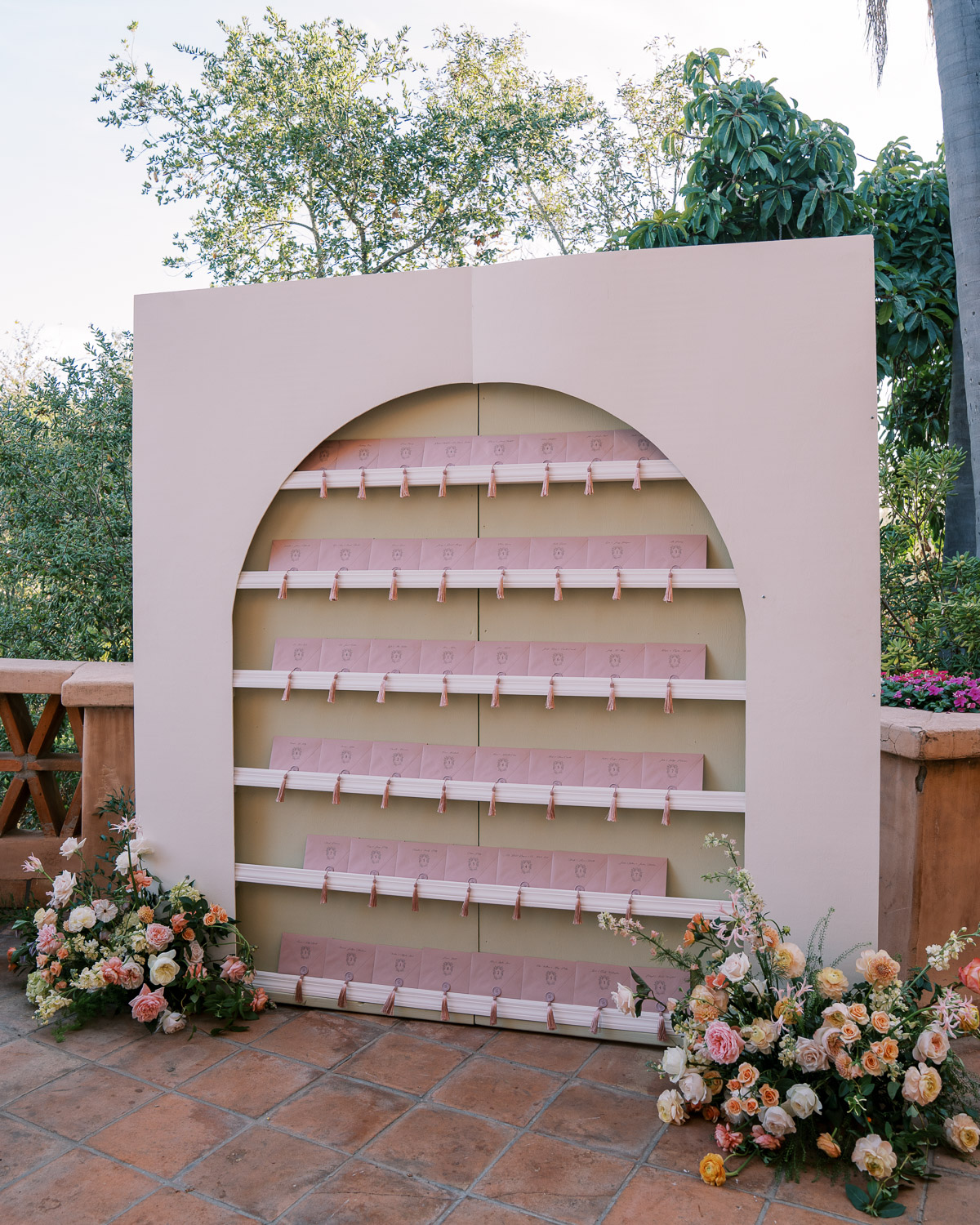 custom arched seating chart at rancho valencia