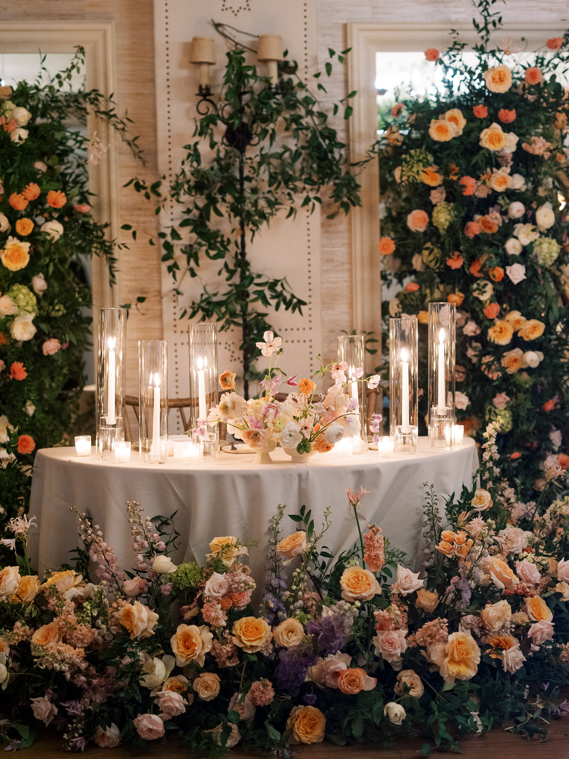 flowers surrounding sweetheart table at terrace ballroom rancho valencia